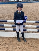 Sophia Taylor (P6) Takes the Rosette for Carnacaville at The InterSchools Show Jumping Series